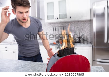 Foto stock: Young Scary Man Looking At Slice Of Burn