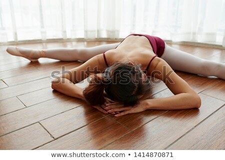 ストックフォト: Asian Dancers Warming Up On Floor