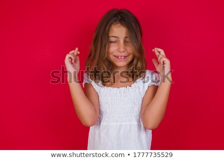 Foto stock: Pleased Caucasian Female With Curly Hair Appealing Appearance Looks Directly At Camera Poses Agai