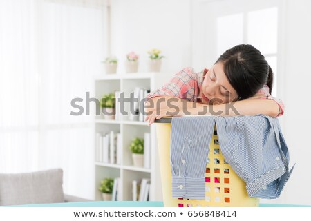 Foto d'archivio: Young Woman Doing The Sorting