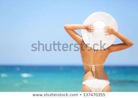 Girl Wearing A Hat Looking At The Ocean Stock foto © Maridav