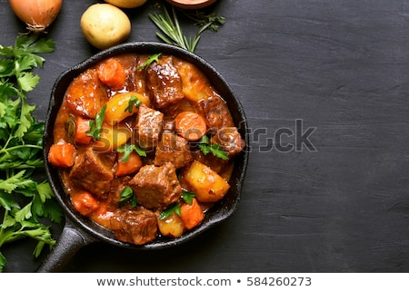 ストックフォト: Roasted Or Stewed Beef Meat With Tomato