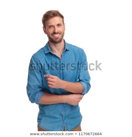 Stockfoto: Young Smart Casual Man Fixing His Sleeve