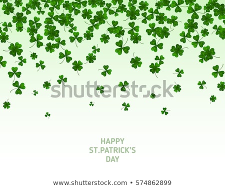 [[stock_photo]]: Saint Patricks Day Illustration With Green Clovers Field On Blue Sky Background Irish Lucky Holiday