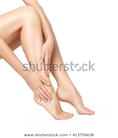 Stockfoto: Long Woman Legs With Beautiful Smooth Skin Closeup Of Female Hand Touching Perfect Hairless Soft An