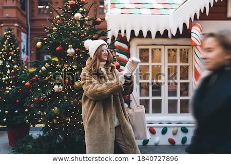 Stock photo: Young Brunette In City Centre