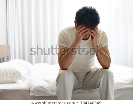 ストックフォト: Depressed Middle Aged Man With Head In Hands