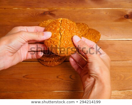 Сток-фото: Woman Breaking Cookie