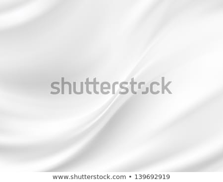 Stock photo: White Smooth Elegant Streaming Silk Or Satin Fabric Texture With Liquid Wave