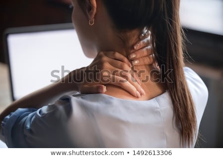 Foto stock: Businesswoman Suffering From Shoulder Pain