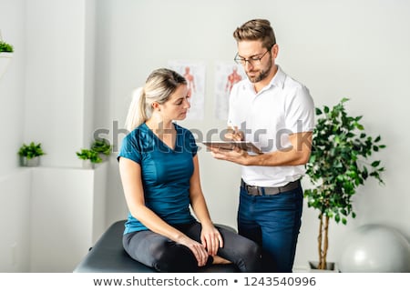 Foto stock: Patient At Chiropractor