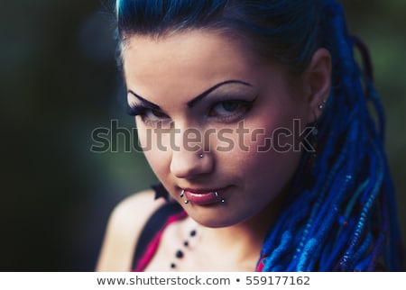 Foto stock: Portrait Of Pierced Teen Girl