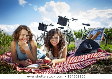 Two Pretty Girls Make A Picnic Zdjęcia stock © BrunoWeltmann