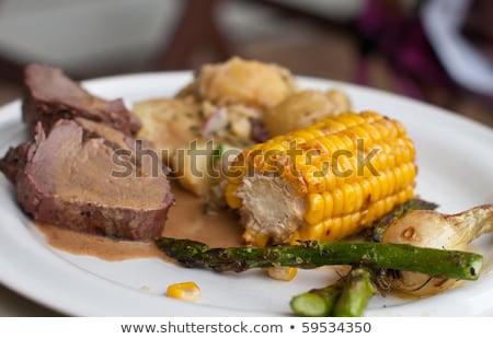 Stock photo: Grilled Beef Steak With Some Sallad On The Side And Corn