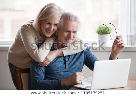 Stockfoto: Business Couple With Computer