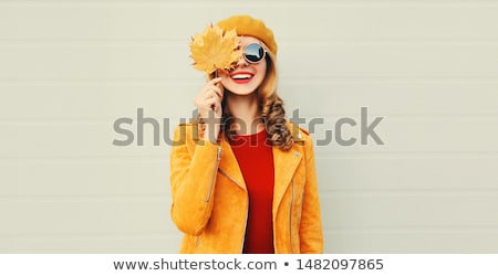 Stockfoto: Portrait Of Cheerful Young Woman In Autumn Season