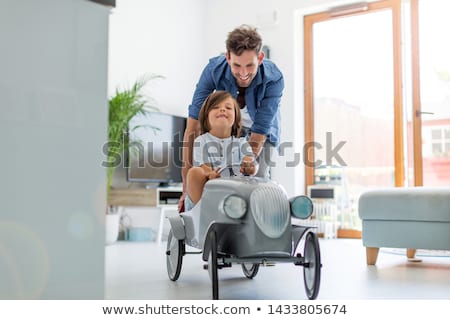 Foto d'archivio: Little Boy With Father In The Car