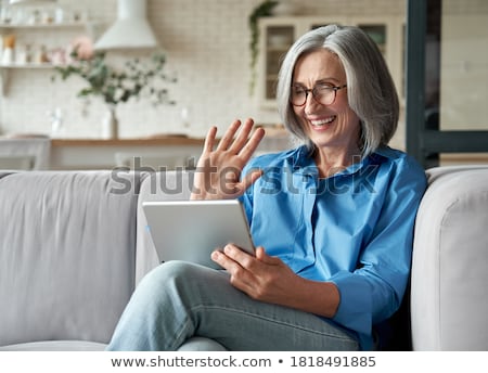 ストックフォト: Woman Holding A Webcam
