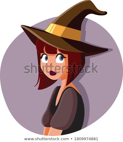 Stockfoto: Mischievous Girl Wearing A Halloween Witch Costume