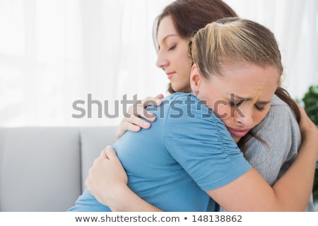 Foto stock: Friends Consoling Woman