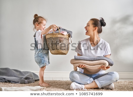 Stock photo: Family Doing Laundry At Home