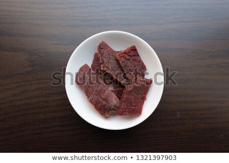 ストックフォト: Beef Jerky On The White Plate