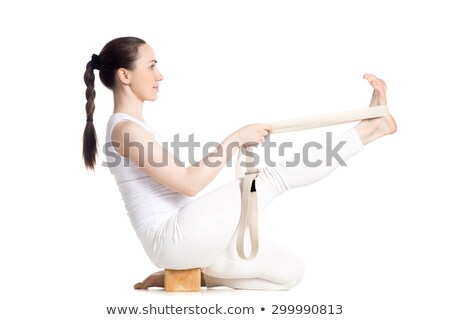 Foto stock: Happy Young Woman Doing Workout With Yoga Belt