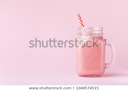 [[stock_photo]]: Mason Jar Glass With Juice And Fruits On Table