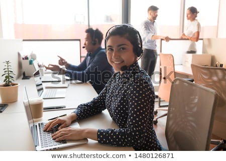 Сток-фото: Helpline Operator In Headset Working At Office