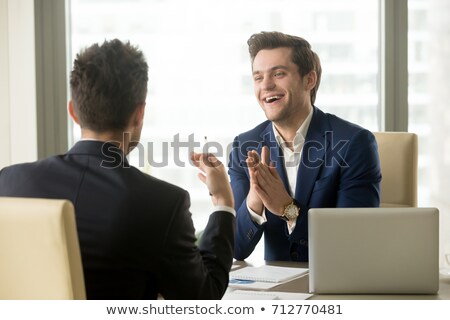 Foto d'archivio: Two Businessman Having A Pleasant Conversation
