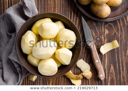 [[stock_photo]]: Plate Of Peeled Potatoes