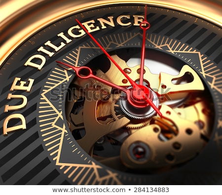 Foto d'archivio: Due Diligence On Black Golden Watch Face