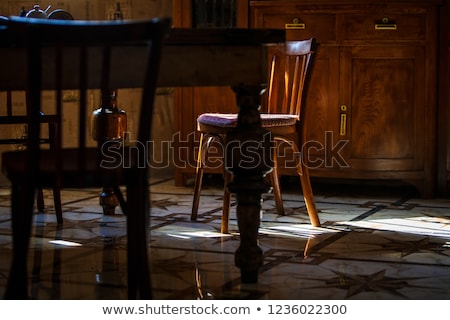 Stockfoto: Empty Dining Table In Illuminated Restaurant