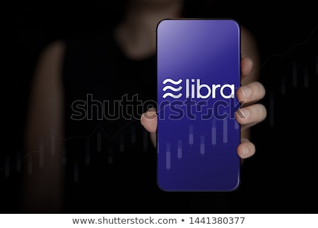 ストックフォト: Woman Holding Facebook Sign