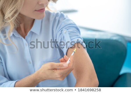 ストックフォト: Close Up Of Woman Injecting Her Arms