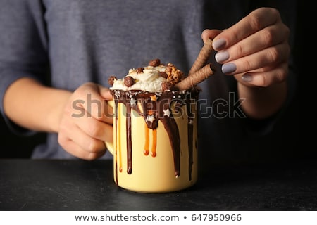 Foto stock: Women Drinking Hot Chocolate And Eating Waffles