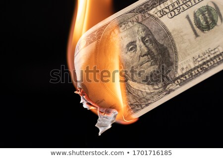 Stock fotó: 100 Dollar Bills Burned Financial Loss Recession Depression Risk