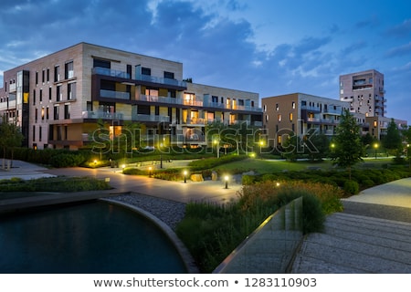 [[stock_photo]]: Apartment Building At Night