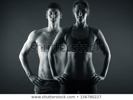 ストックフォト: Man With A Muscular Body On Black Background