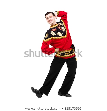 Stockfoto: Attractive Man Wearing A Folk Russian Costume Dancing