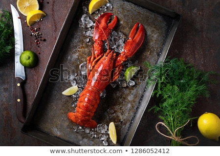 Stock fotó: Cooked Lobsters On A Table With Lime And Parsley