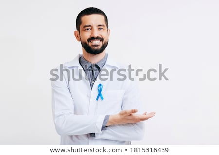 ストックフォト: Doctor Hand With Prostate Cancer Awareness Ribbon