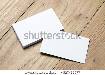Foto d'archivio: Blank Business Cards On Wooden Table