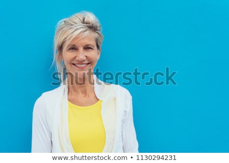 Foto stock: Portrait Relaxed Mature Woman Colourful