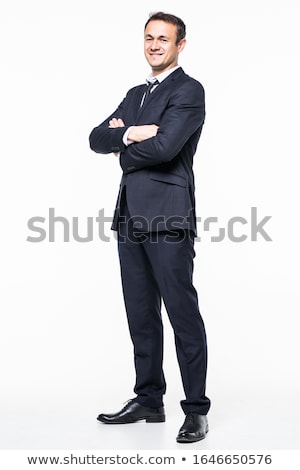 Stock photo: Confident Businessman Standing With Arms Folded