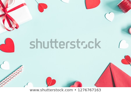 Foto d'archivio: Valentines Day Pattern Of Red Hearts Confetti On White Background
