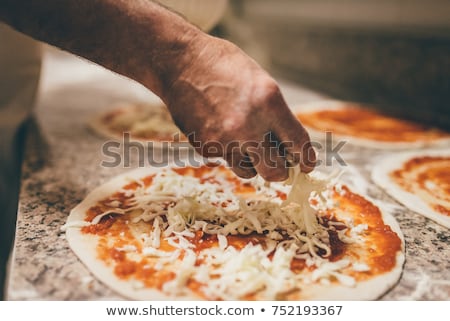 Foto d'archivio: Preparation Pizza