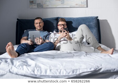 Zdjęcia stock: Happy Gay Couple Homosexual People Men Using Tablet