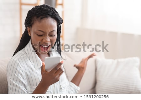 Сток-фото: Angry Woman Yelling At The Phone