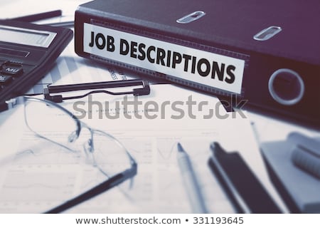 Foto stock: Descriptions On Office Binder Blurred Image